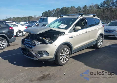 2018 Ford Escape Titanium z USA, uszkodzony, nr VIN 1FMCU9J96JUB05585